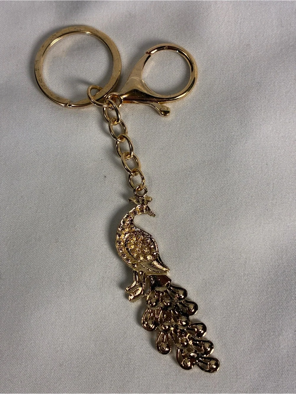 Gold Peacock Keychain with Black and Multicolor Crystal Accents